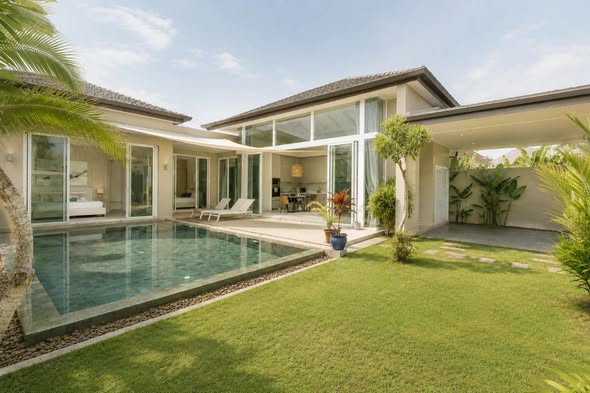 within an exclusive gated community near Laguna, this spacious three-bedroom villa combines modern Western comfort with tropical serenity—pe