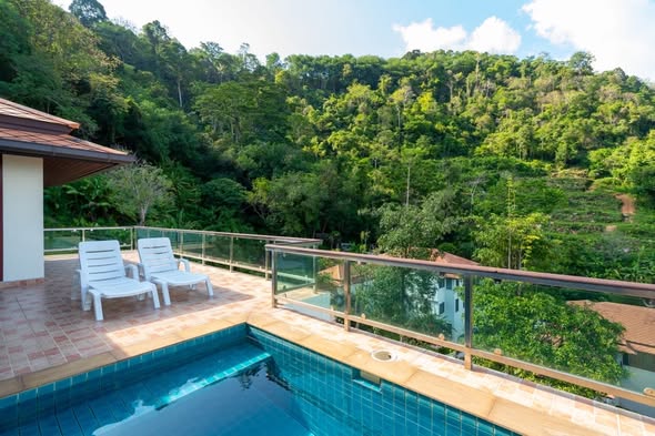 This expansive 2-story pool villa located in the peaceful hillside of Soi Yotsane, Chalong (right near the iconic Big Buddh