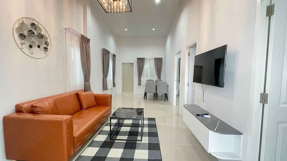 for Rent – The Cube Amaze Srisoontorn Spacious room with a pool view, conveniently located near Bang Tao Beach, fully furnished with furni